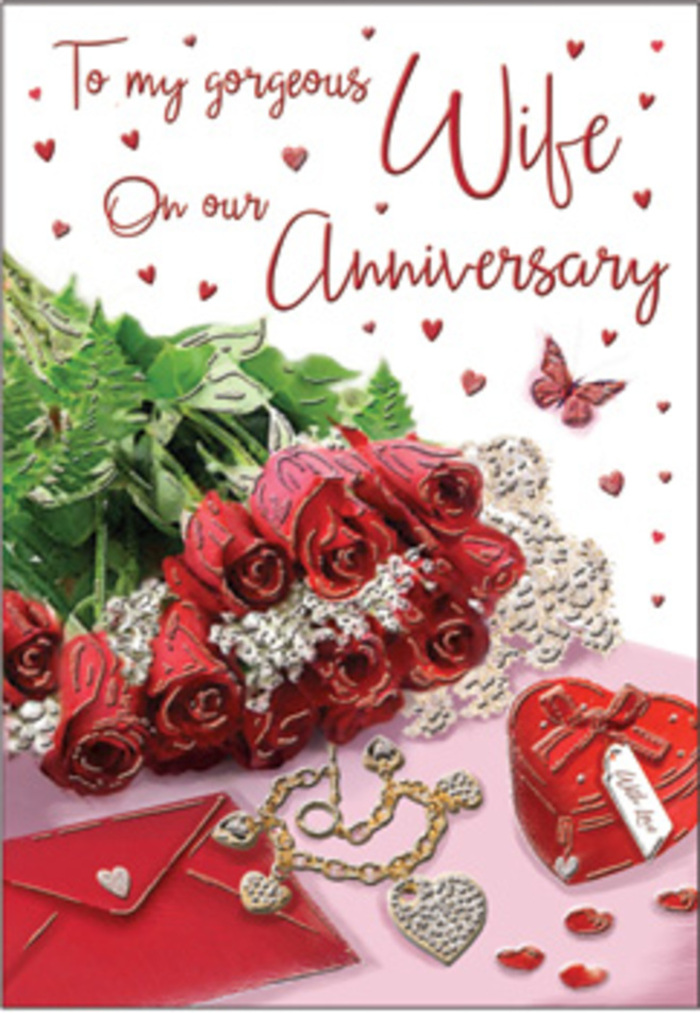 An elegant anniversary tableau unfolds as though arranged on a polished table in a Bow home, illuminated by calm, diffused daylight. Dominating the scene is a compact bouquet of red roses, their petals rich and velvety, curling outward in layered spirals that suggest fullness and maturity. Each rose is framed by fresh greenery, the leaves catching subtle highlights that make them seem almost dewy, as if the flowers have been freshly delivered from a local florist. To one side, an envelope lies invitingly, paired with a carefully folded card whose graceful script hints at heartfelt words of devotion and gratitude. Nearby, a small keepsake heart box and a delicate piece of jewellery lend a sense of treasured tradition, like anniversary gifts exchanged through many years of companionship in Bow and the surrounding streets near Grove Hall Park. Tiny heart-shaped decorations are scattered across the surface, along with a lone butterfly motif that adds a gentle, whimsical note, as if symbolising transformation and the evolving nature of long-term love. The palette is dominated by passionate reds, warm creams, and touches of gold, while the interplay of light and shadow creates depth and intimacy. Every element appears thoughtfully positioned, with the roses anchoring the composition the way a bouquet anchors a celebration table. The overall feeling is of a quiet, meaningful moment captured in stillness: the rustle of paper, the soft brush of petals, and the emotional weight of a message written by hand. It is the visual echo of an anniversary evening in Bow, where shared memories, small gestures, and enduring affection are quietly honoured.