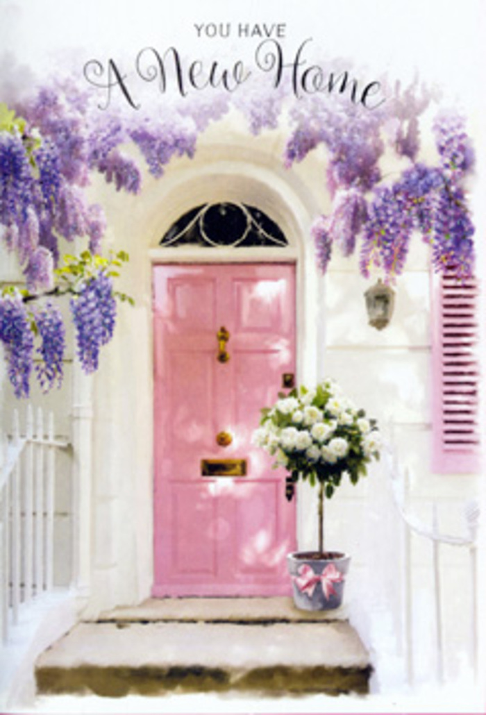 This image shows a peaceful doorway in Bow that feels like the first page of a new chapter, the kind of entrance you might stumble upon while walking from Old Ford Road towards the canal. A soft pink front door takes centre stage, its pastel shade both playful and refined, framed by whitewashed walls that lend a clean, airy backdrop. Above, wisteria in full spring bloom tumbles gracefully, its long clusters of lavender and lilac blossoms draping down like a velvet curtain. Each strand of flower seems to catch the gentle light, hinting at their delicate, powdery fragrance that would mingle beautifully with the freshness of the open air. Beside the door, a lightly painted shutter echoes the blush tones, tying the facade together with a sense of curated charm. On the step, a simple yet elegant florist's tin bucket has been turned into a luxurious housewarming display, filled with lush white and creamy roses at the peak of their openness. Their petals curl outwards in soft spirals, plush and inviting to the touch, while pockets of soft green foliage peek between the blooms, giving depth and dimension. Around the bucket, a satin pink bow has been carefully tied, its sheen catching the light and repeating the colour story of the door and shutter. Everything in the frame feels considered yet effortless, like flowers delivered the same day to a new home in Bow to help it feel instantly lived-in and loved. The overall mood is gentle, optimistic, and quietly emotional, perfectly suited for congratulating someone on their move and filling their doorstep with beauty, kindness, and a heartfelt sense of welcome.